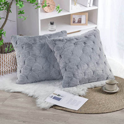 Housse de coussin jacquard en fausse fourrure
