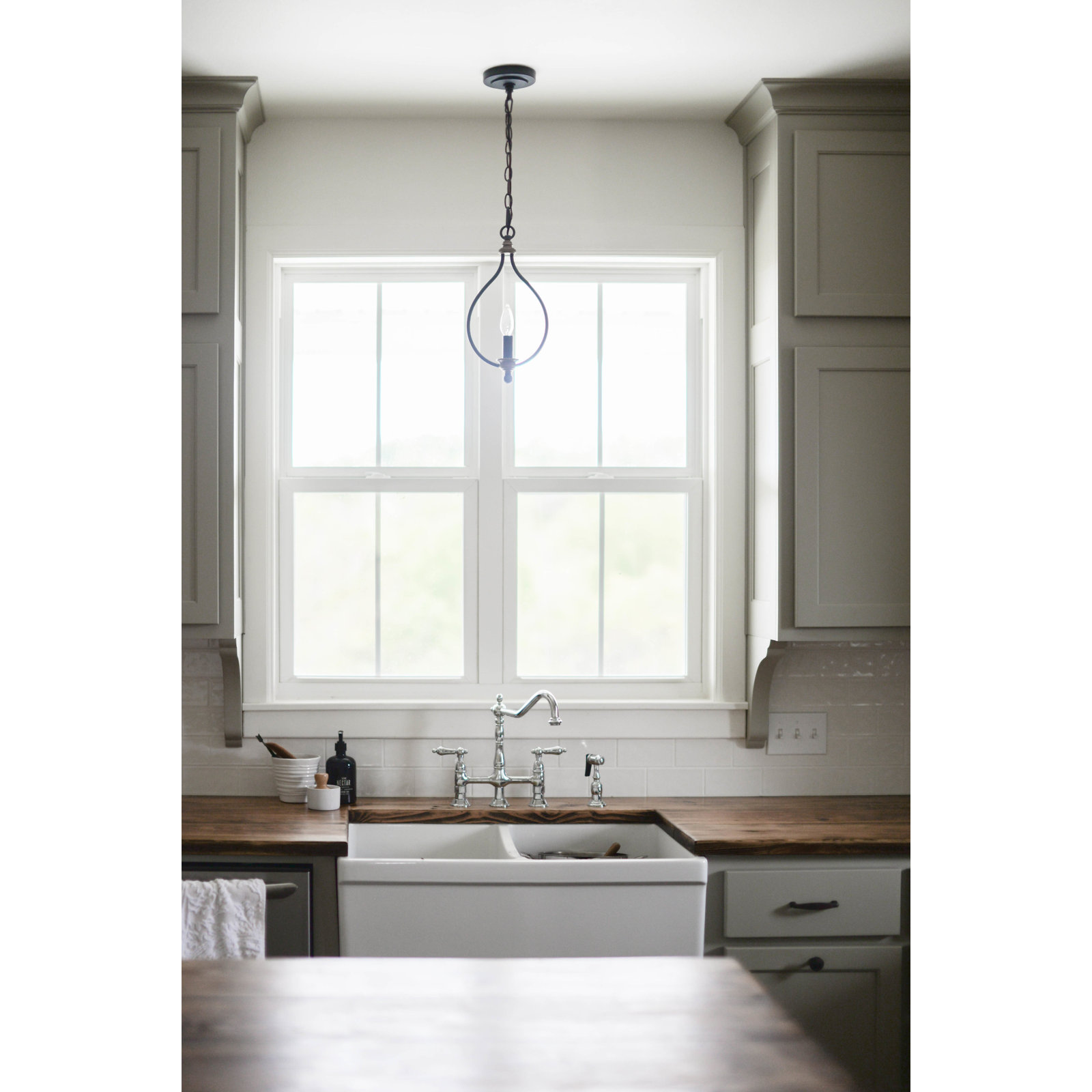 Kingston Brass Heritage Two-Handle 4-Hole Deck Mount Bridge Kitchen Faucet with Brass Side Sprayer, Polished Chrome