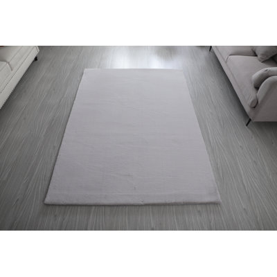 Tapis touffeté gris clair