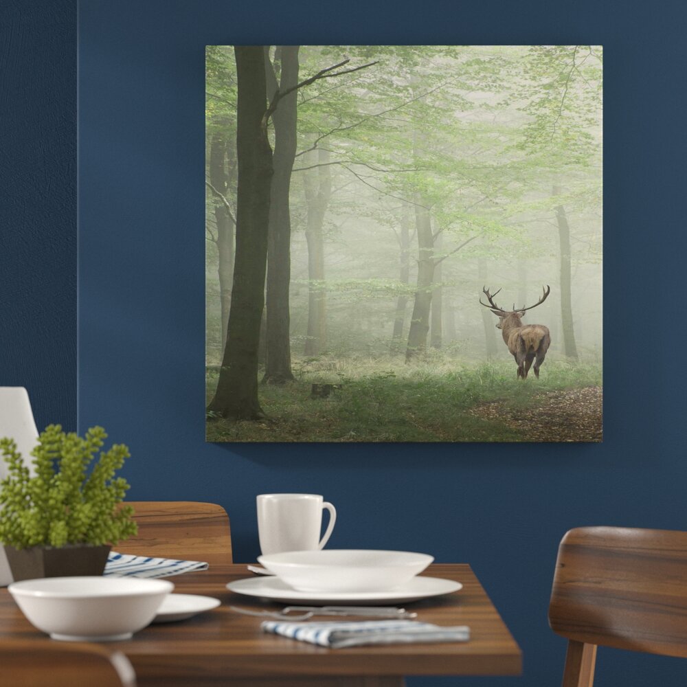 Leinwandbild Hirsch im Wald