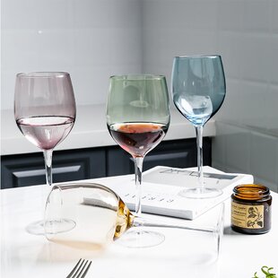 https://assets.wfcdn.com/im/71918077/resize-h310-w310%5Ecompr-r85/1203/120304040/balchand-4-piece-16-oz-all-purpose-wine-glass.jpg