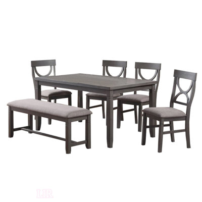 Ensemble de salle à manger 6 pièces en bois avec chaises rembourrées et banc Dacher, parfait pour les réunions de famille et les intérieurs modernes.