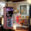 Armoire à vin autoportante, refroidisseur à vin élégant avec porte en verre résistante aux rayons UV, éclairage DEL et support de rangement