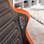X Rocker Ergonomic Faux Leather Rocker Game Chair in Black/Orange