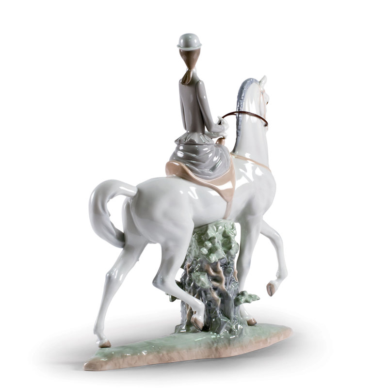 Woman on Horse Figurine
