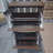 23.6-Inch Walnut Modern Shoe Cabinet With 2 Flip Drawers, Medieval Independent Fence Design