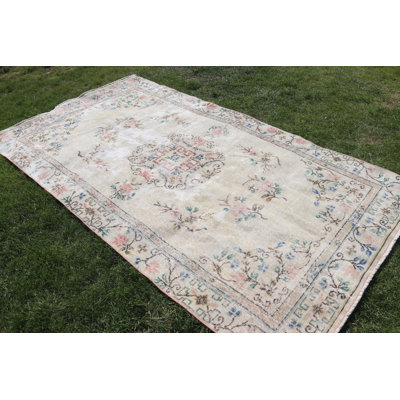 Vintage Turkish Large Rug with Floral Design in Muted Tones Perfect for Enhancing Living Room Decor
