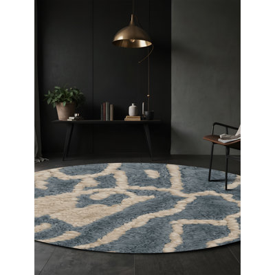 Tapis gris soyeux et moelleux