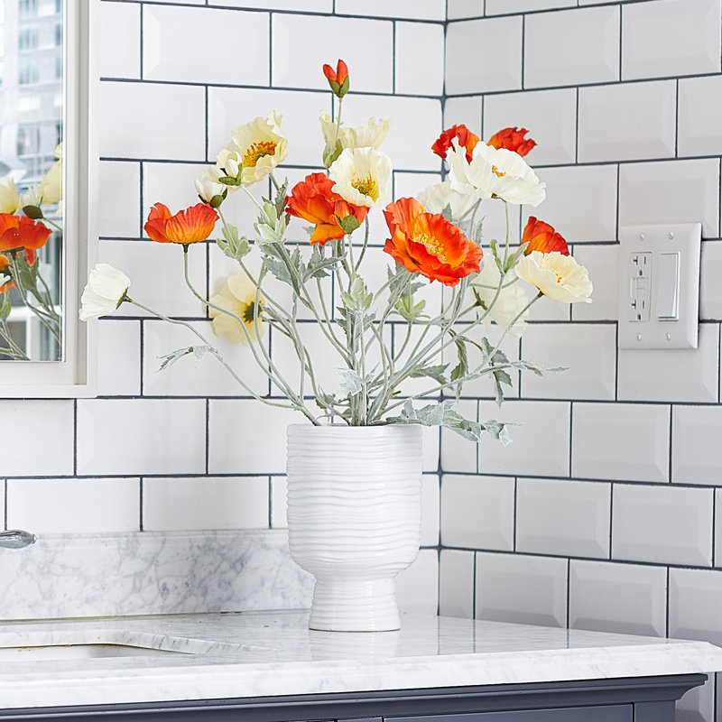 Arrangement floral coquelicot en pot