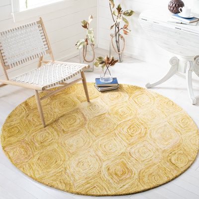 Tapis doré en laine touffeté à la main Alora