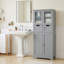 Armoire de rangement de salle de bain autoportante robuste à grande capacité à 4 portes résistante à l'eau avec 2 tiroirs coulissants et portes vitrées transparentes pour la salle de bain-954859753