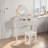 Elegant Makeup Vanity Table With Reversible Four-leaf Shaped Mirror, 5 Drawers, Golden Round Handles And A Stool
