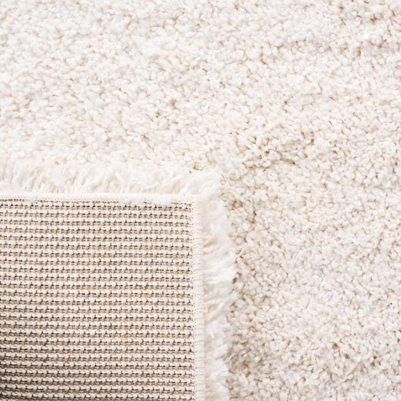 Solid Colour Machine Woven Polypropylene Area Rug in Cream, Rectangle 6'7" x 9'