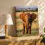 Toile, Un jeune éléphant se tient dans une savane grasse-1231561813