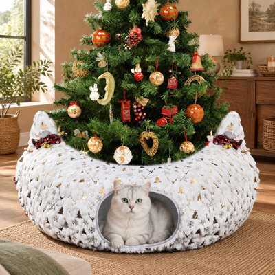 Measuring 2.6ft x 2.6ft x 10in, this under-tree Christmas tunnel bed folds into an indoor donut cave/tree skirt for kittens and other small animals.