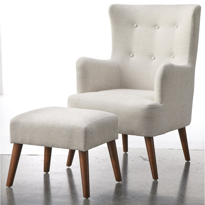 Fauteuil à oreilles rembourré avec repose-pieds Piersten
