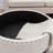 Gotelind Natural Round Storage Ottoman