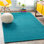 Tapis bleu sarcelle en laine tissé à la main Americus