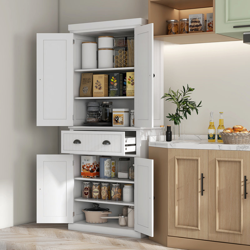 Garde-manger blanc de 72 po, grande armoire avec tiroir et portes. Permet de ranger plusieurs articles ménagers tels que l'argenterie, les serviettes, la batterie de cuisine. Possède des tablettes réglables. Apporte de l'élégance à la cuisine.