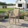 63" Patio Dining Set with Extra Large Rectangular Dining Table and 6 Stackable Armrest Chairs