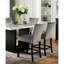 Ensemble de salle à manger transitionnel 7 pièces avec table rectangulaire en marbre et 6 chaises hautes rembourrées à dossier plein, garnies de clous décoratifs, disponibles en blanc, gris ou noir. Différentes combinaisons de couleurs.