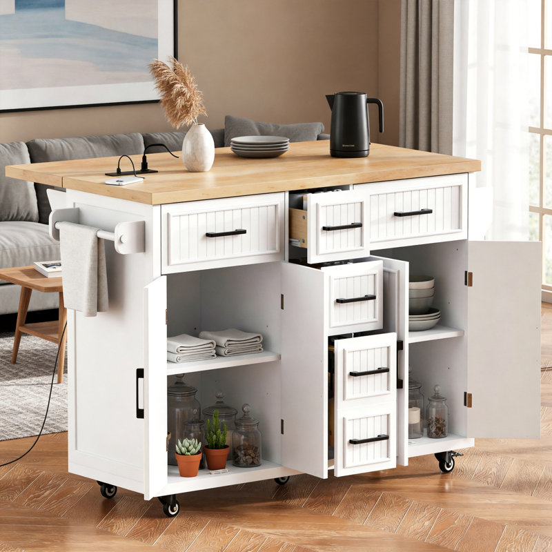 56.6-Inch White Kitchen Island With Folding Tabletop And Power Outlets, Embossed Vertical Stripes, Wheeled Trolley, 4 Doors, 5 Drawers, And Adjustable Shelves.