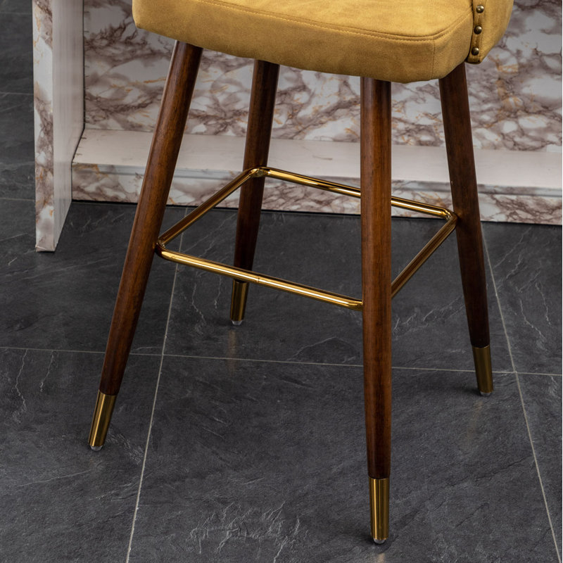 Ensemble de 2 tabourets de bar comptoir en similicuir et garniture cloutée, Jaune