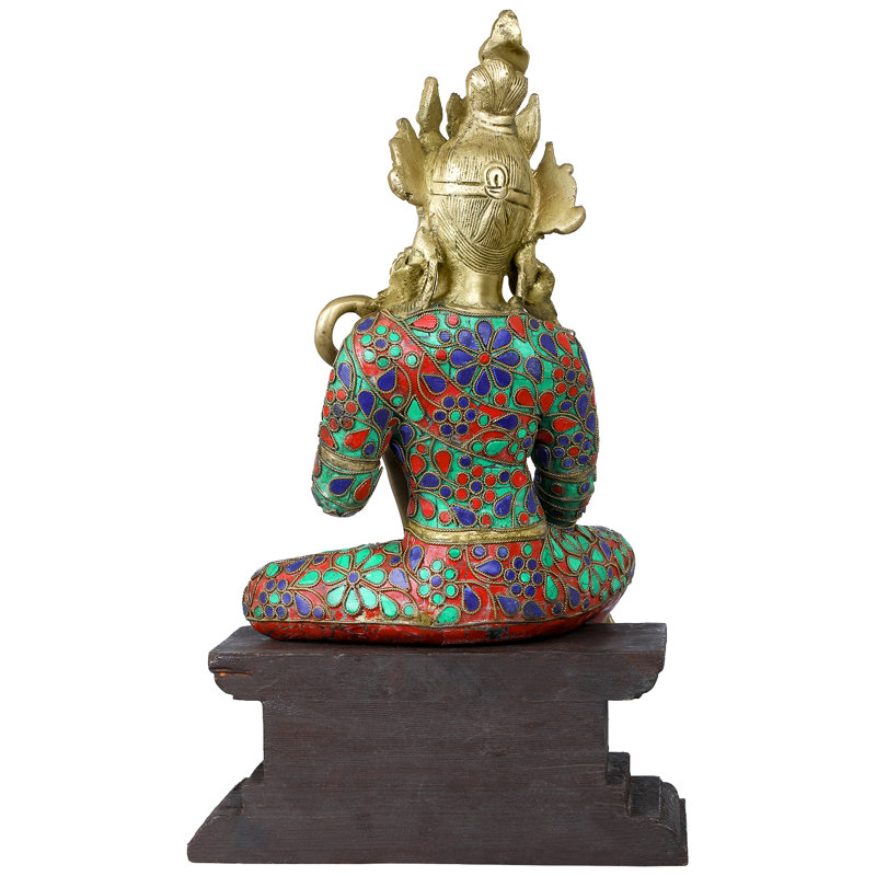 Figurine Devi Saraswati assise sur un piédestal en bois