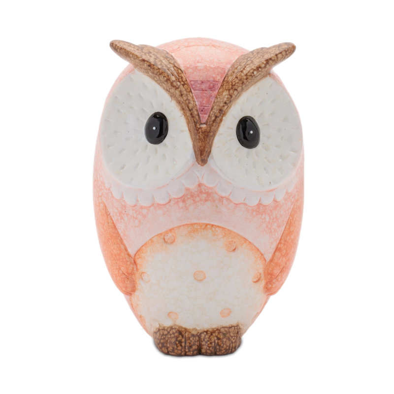 Ensemble de trois figurines de hibou en terre cuite rose et beige