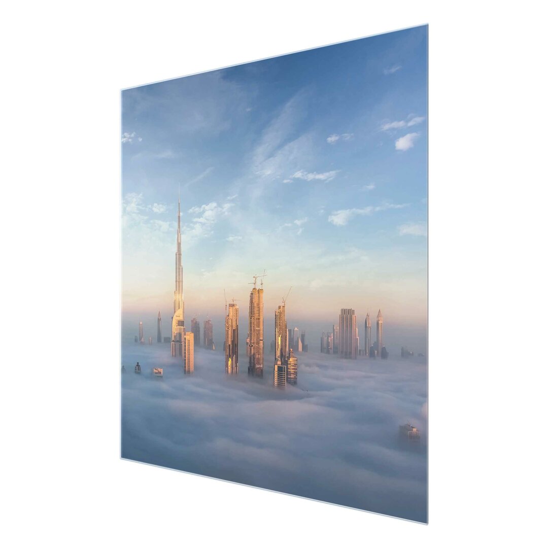 Glasbild Dubai über den Wolken