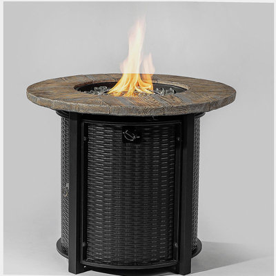 Circular propane pit table with lava rock