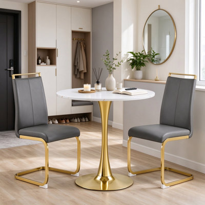 Ensemble de table de salle à manger ronde à pied central (2 pièces) avec des chaises rembourrées en cantilever