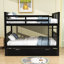 Lit superposé double au-dessus d'un lit double avec lit gigogne simple-559956396