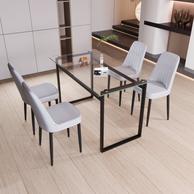 Ensemble de salle à manger élégant en verre trempé pour 4 personnes - table de cuisine élégante et durable avec chaises confortables