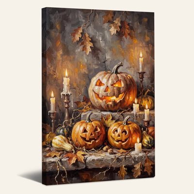 Citrouilles sculptées avec chandelles allumées et toile murale d'Halloween