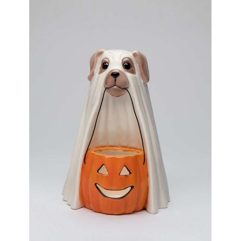 Chien en céramique avec bougeoir en forme de citrouille