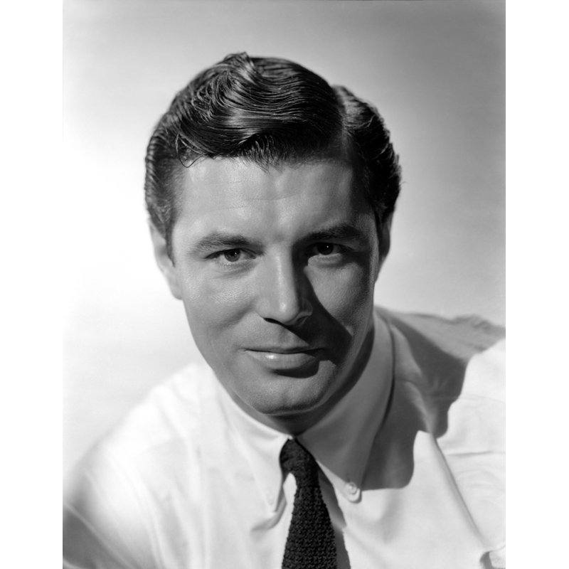 Portrait de James Craig souriant - photographie sans cadre, H 10 po x l 8 po
