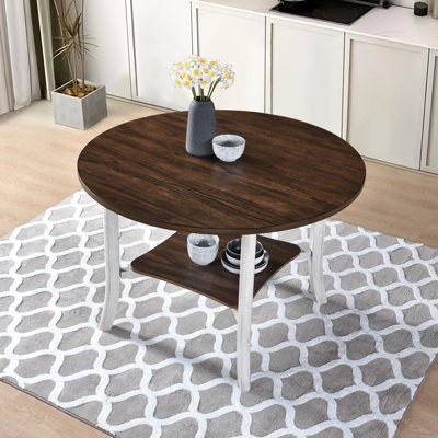 Table de salle à manger ronde 45,7 pouces avec tablette inférieure. Conception rustique et classique. Bois massif +. Chêne foncé antique blanc. 45,58 po de largeur, 30 po de hauteur. Économise de l'espace dans les espaces. S'agence au charme de plusieurs styles de décor