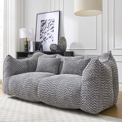 Fauteuil à billes doux avec noyau en mousse haute résilience pour deux personnes.