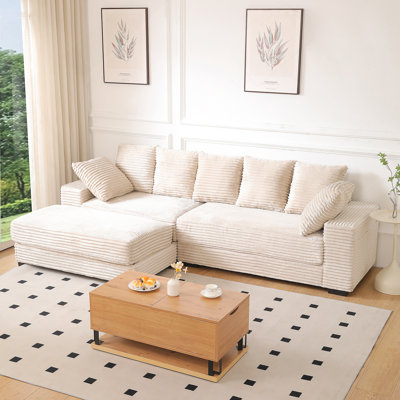 Canapé modulaire avec repose-pieds avec rangement et coussins décoratifs, confortable et fonctionnel pour la détente et le divertissement dans le salon