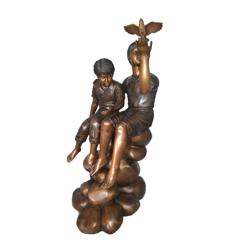 Statue deux enfants sur des rochers avec un oiseau en bronze - Taille: L 36 po x l 30 po x H 44 po.