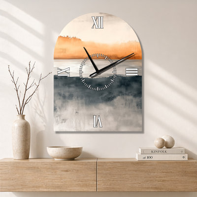 Horloge murale moderne à arc, motif paysage côtier doux orange et noir