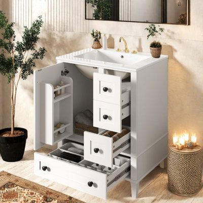Meuble-lavabo compact en bois blanc avec lavabo en céramique, style moderne pour les salles de bain peu encombrantes