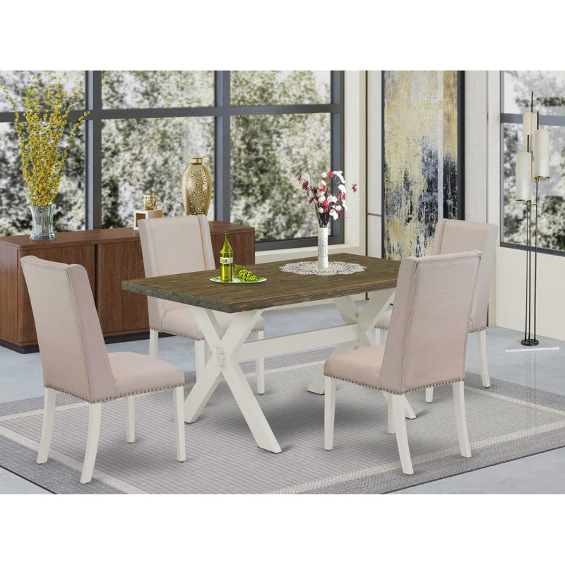 L'ensemble de table de cuisine 5 pièces pour 4 personnes comprend une table de salle à manger rectangulaire avec pieds en X et 4 chaises de salle à manger Parson en tissu crème, fini lin brossé blanc