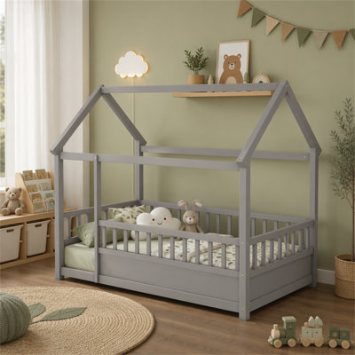 Lit simple en bois avec structure de toit, garde-corps de clôture