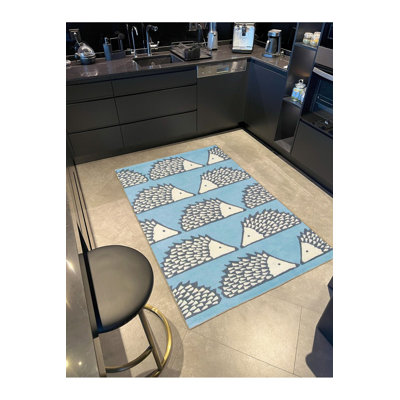 Tapis bleu tissé lavable à la machine à motif hérisson