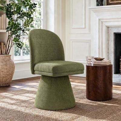 Fauteuil pivotant rembourré en tissu
