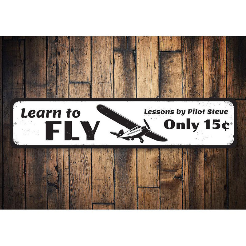 Plaque en métal «Apprendre à voler», H 4 po x l 18 po x P 0,04 po