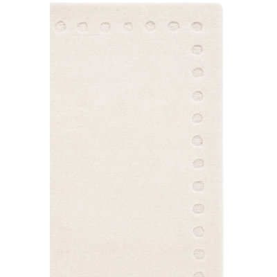 Tapis de couleur unie en coton touffeté à la main Talena