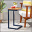 Table d'appoint en fer antique avec plateau en bois naturel, parfaite pour un décor élégant et fonctionnel.